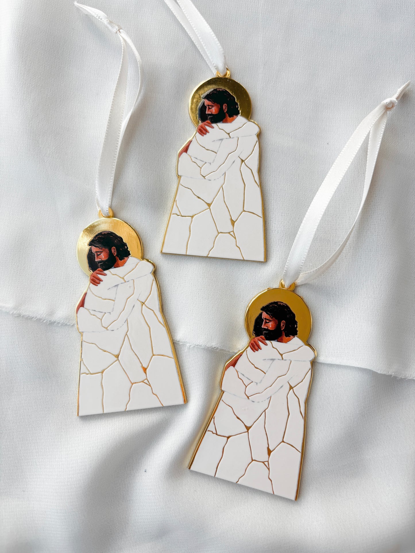 'He Binds Up The Broken Hearted' Gold Enamel Ornament